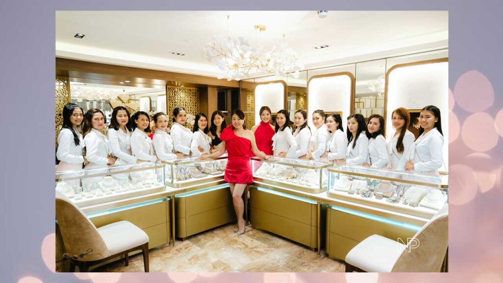 Amy Cho and daughter Yanyan with their team of expert jewellers  that allow clients to custom design their jewellery.